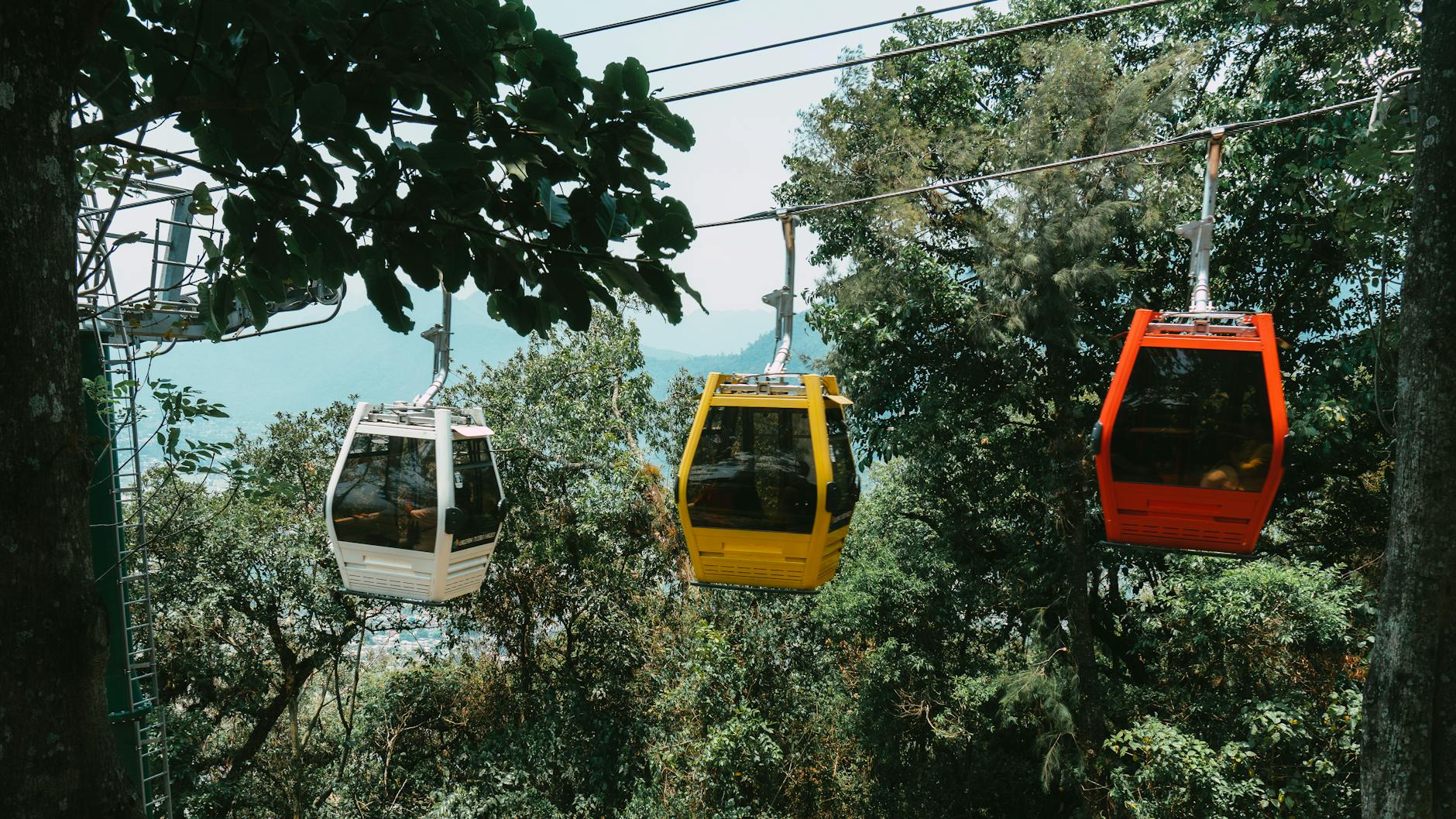 Maokong Gondola cable car ascending green mountains