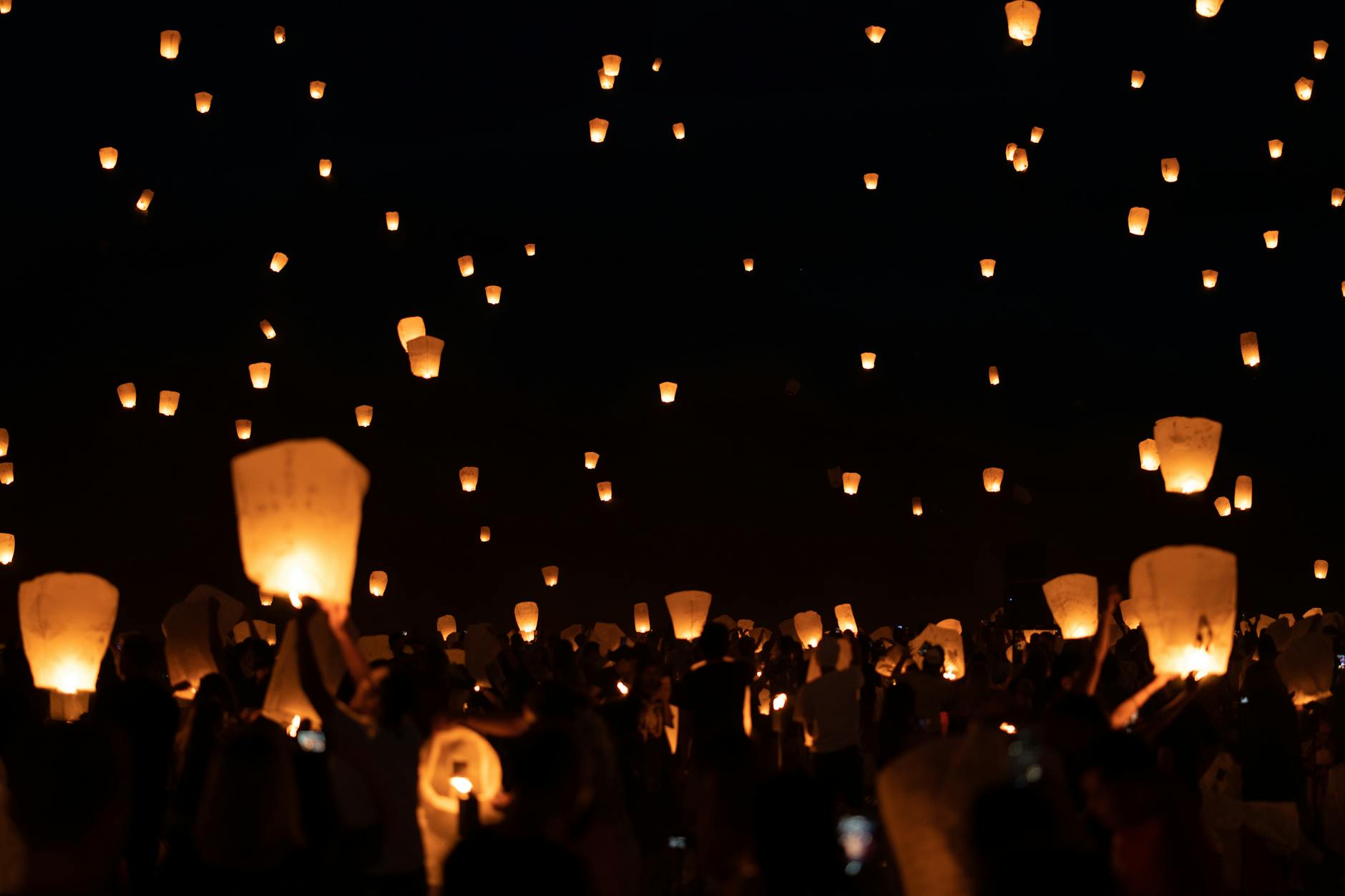 Mesmerizing display of sky lanterns lighting up the night sky