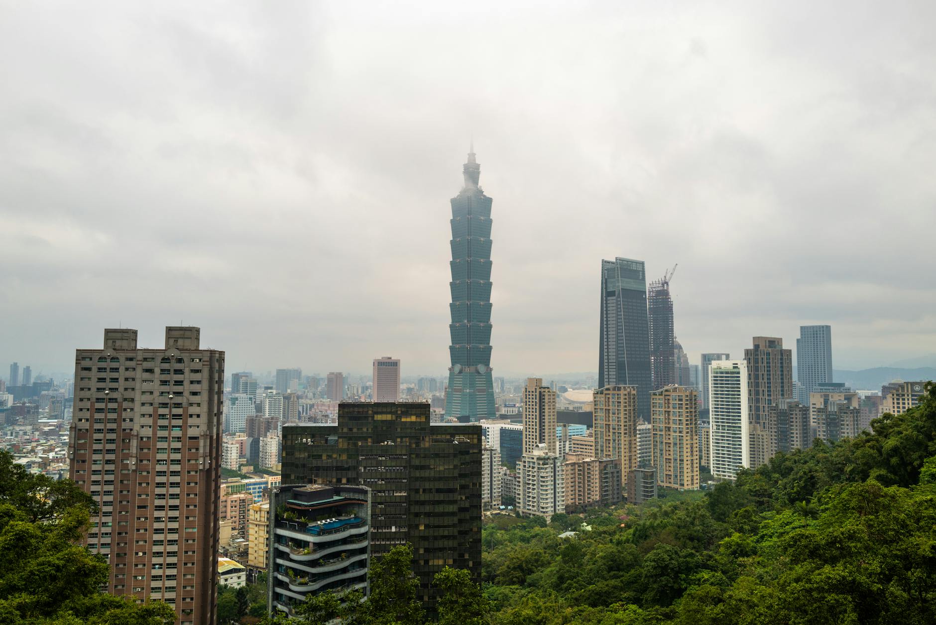 Sweeping view of Taipei skyline with Taipei 101 from Elephant Mountain at twilight
