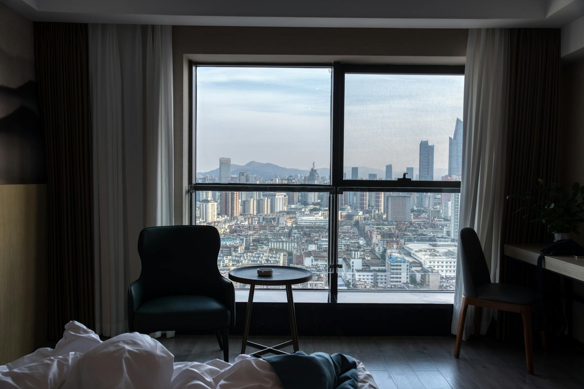 Modern hotel room with city view in Taipei