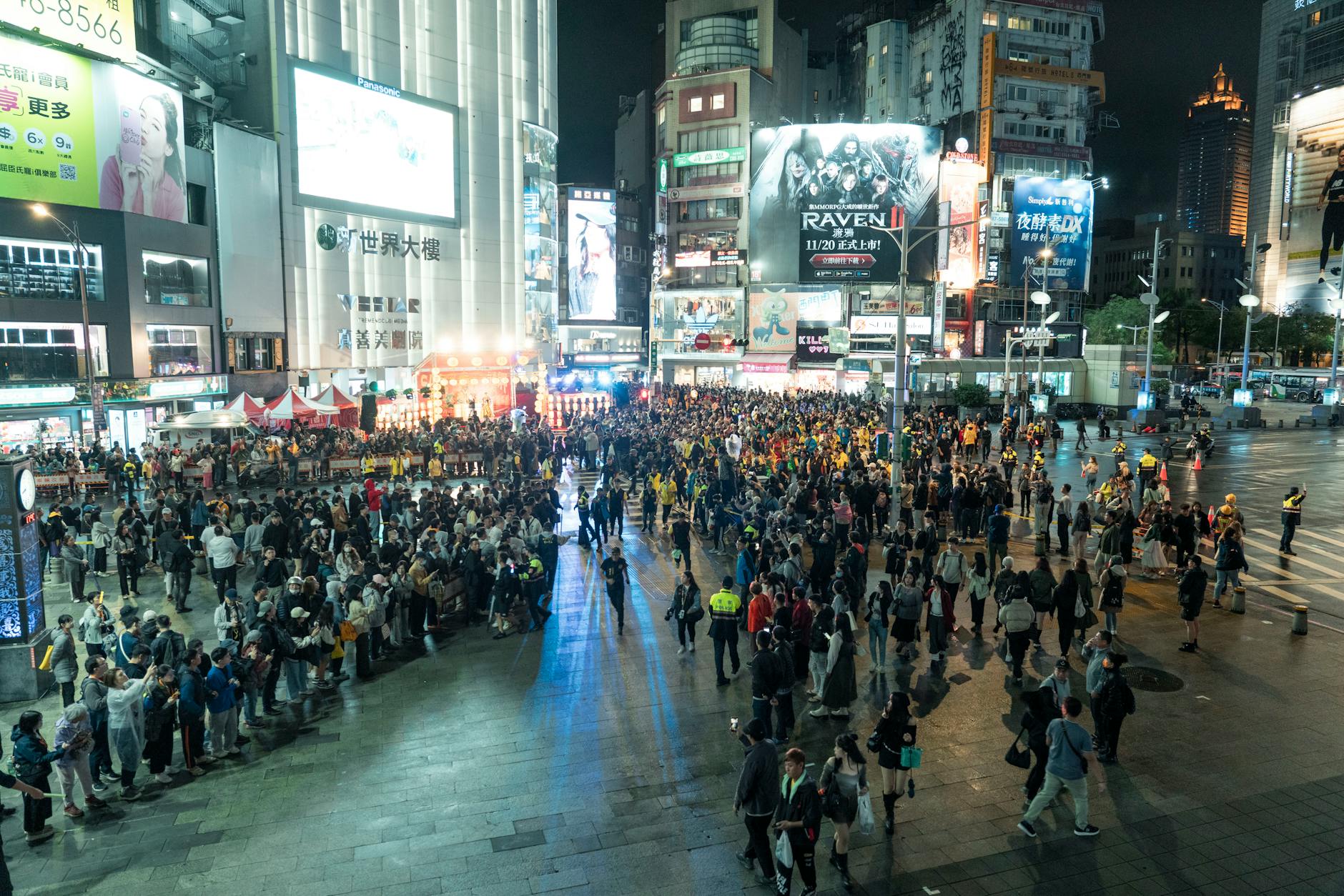 Lively crowd gathers in Ximending at night showcasing Taipei's vibrant urban energy