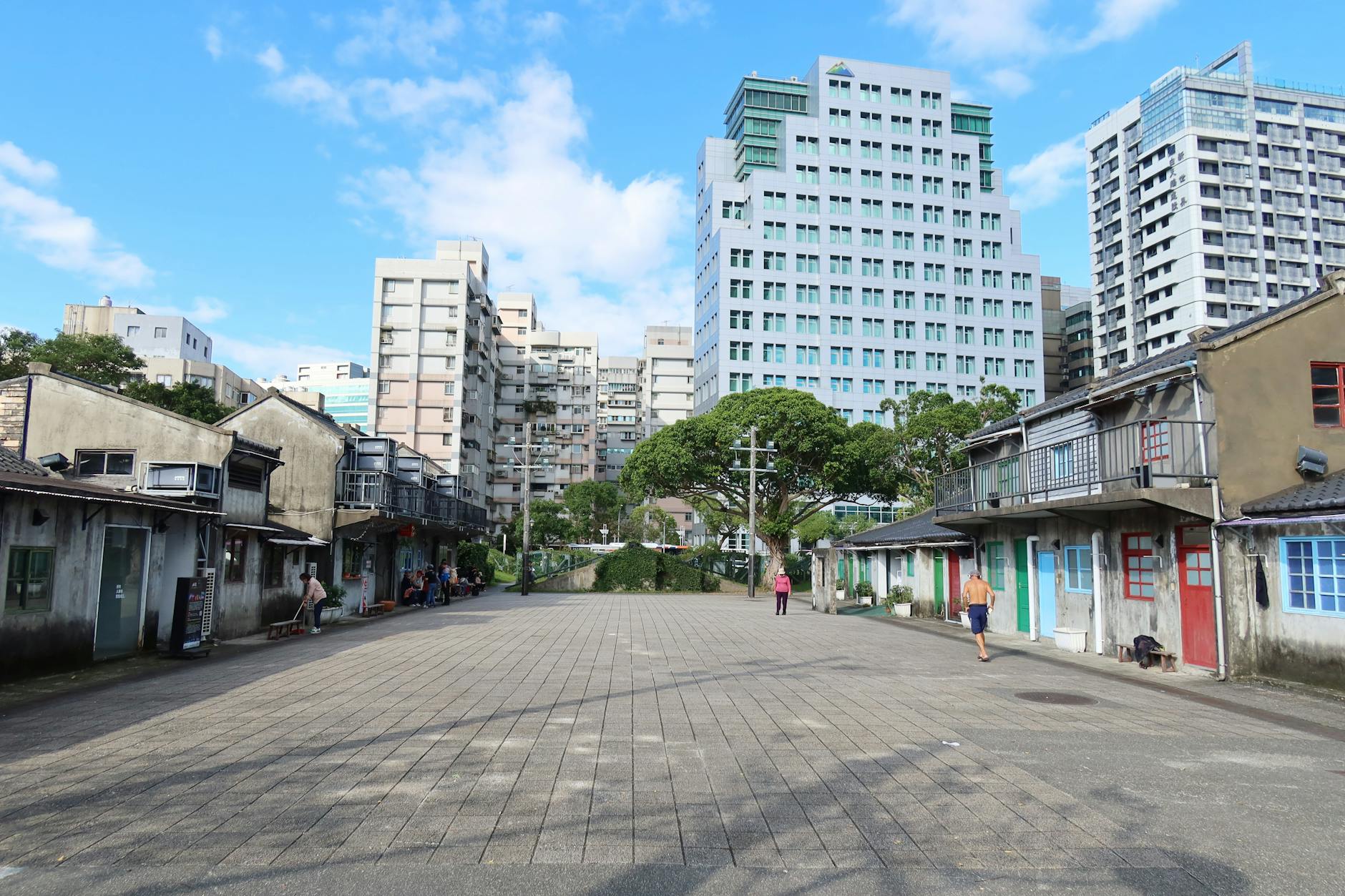 Traditional houses against modern buildings in Taipei City Taiwan