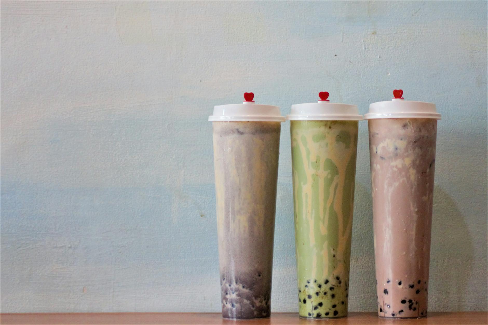 Elegant presentation of bubble tea flavors in sealed cups