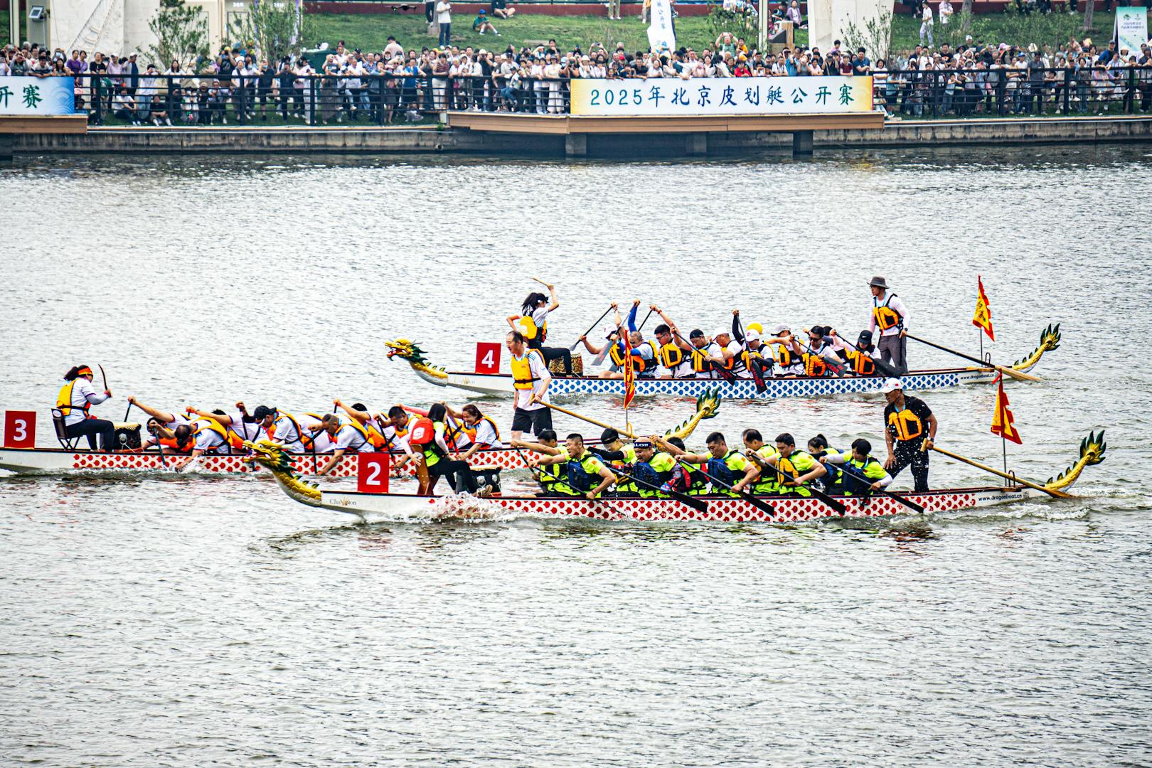 Dragon boat decorated with carved dragon head and tail at Taipei festival