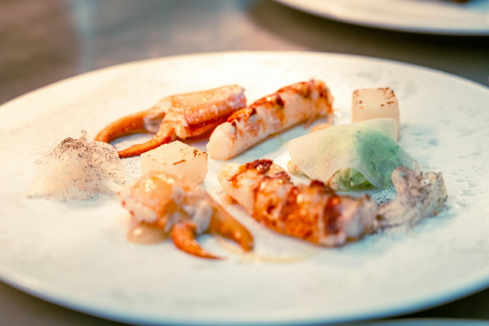 Michelin-starred fine dining plate at a Taipei restaurant