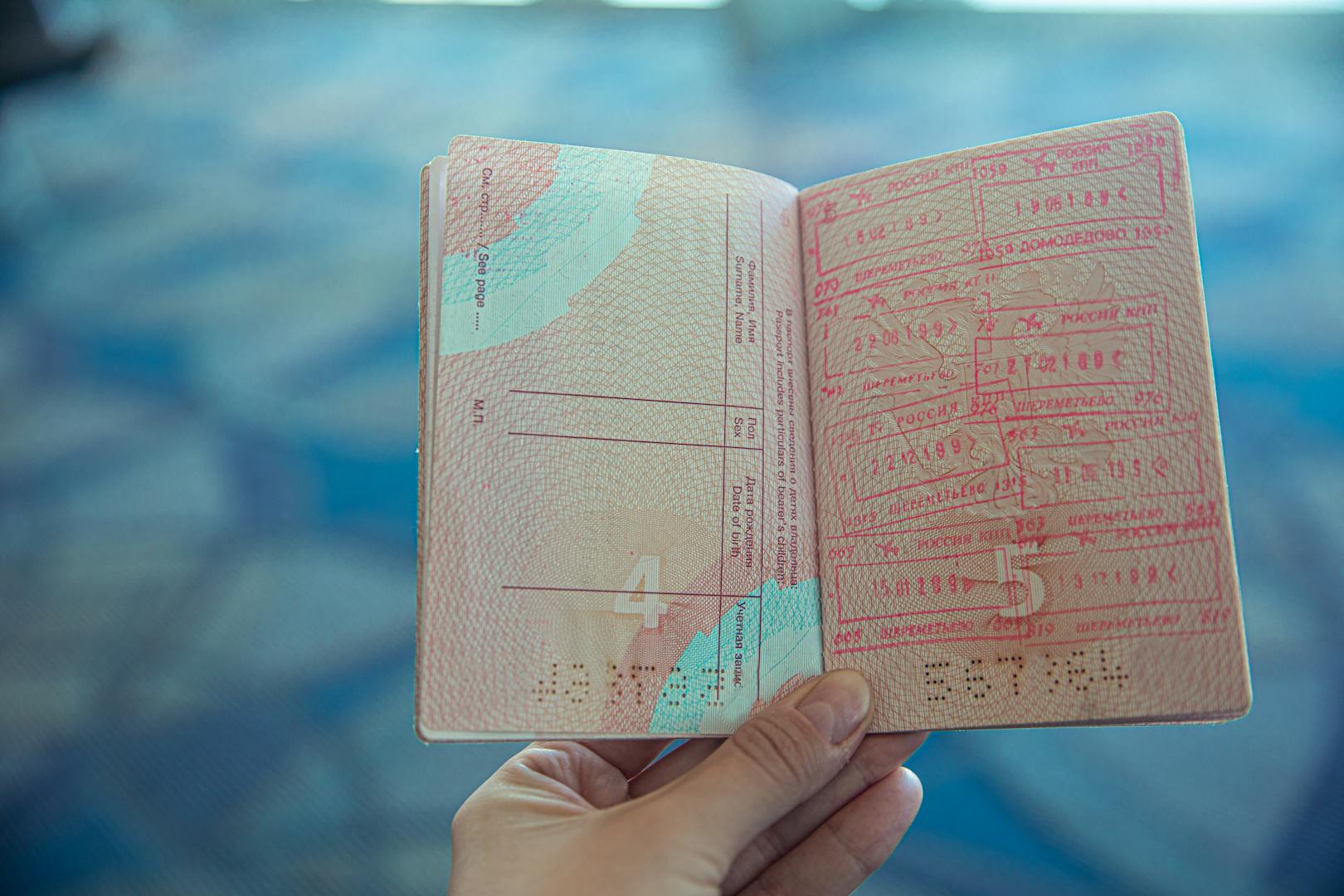 Open passport with Taiwan entry stamp at immigration