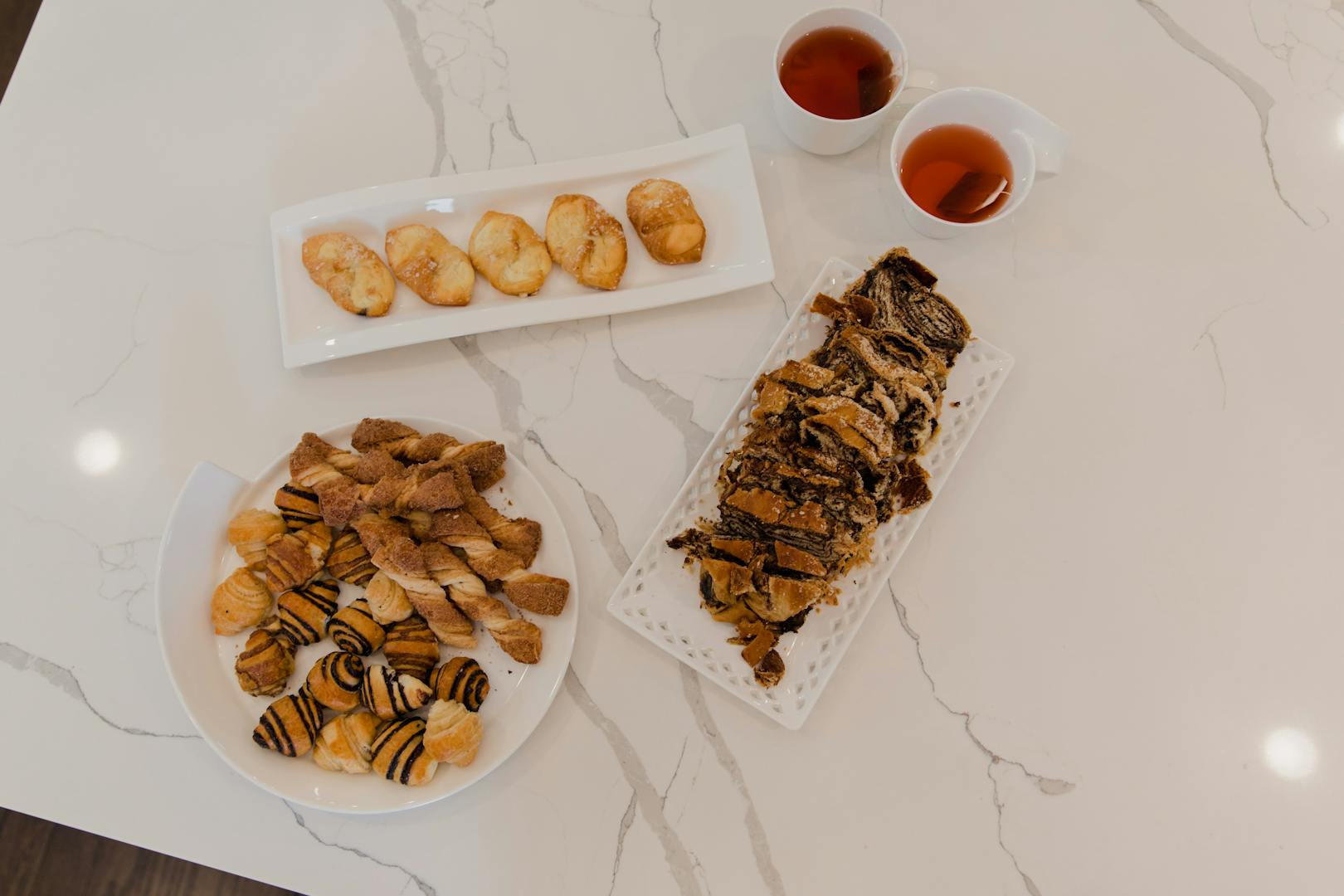 Pineapple cake served with traditional Taiwanese tea at a Taipei bakery