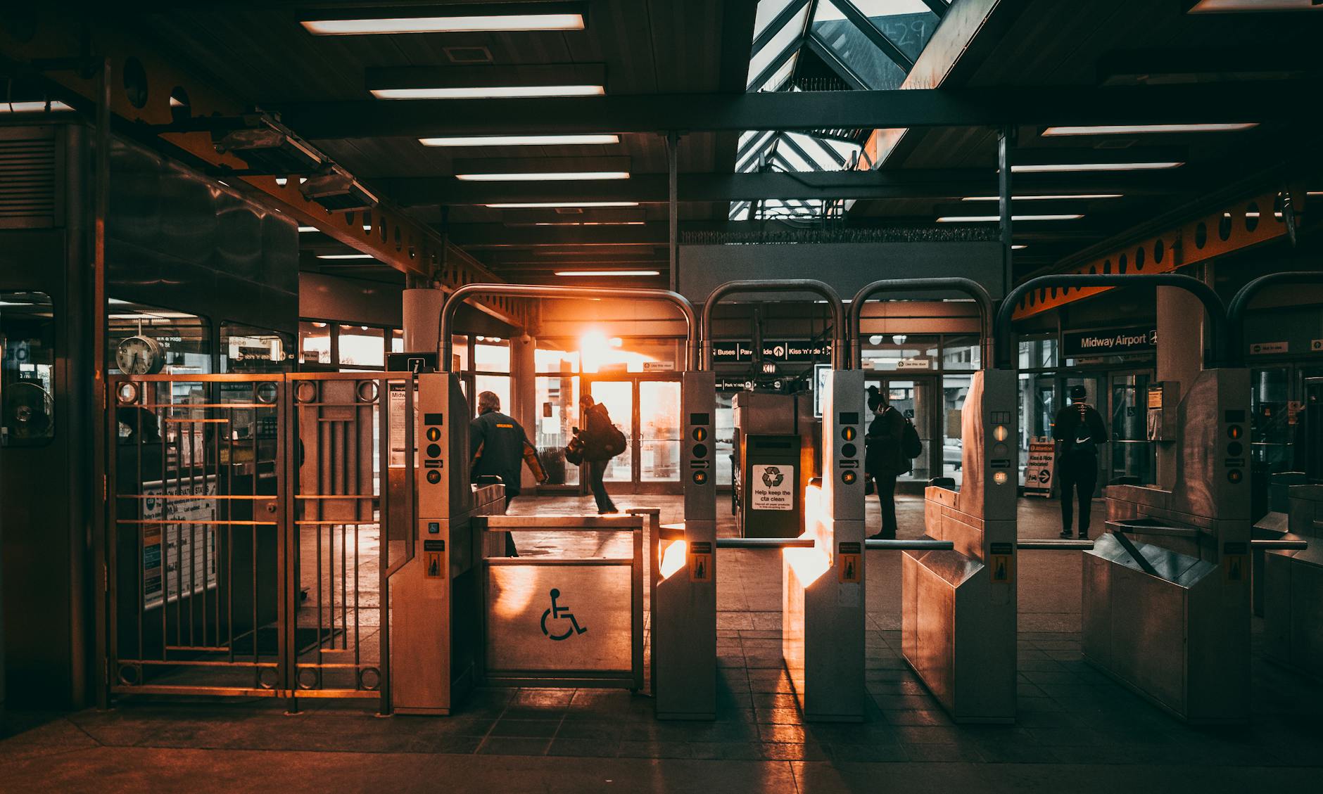 Modern train station platform with travelers