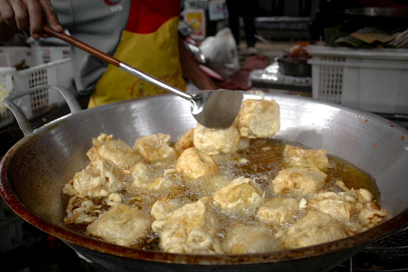 Crispy fried stinky tofu with pickled cabbage and chili sauce at Nanjichang Night Market