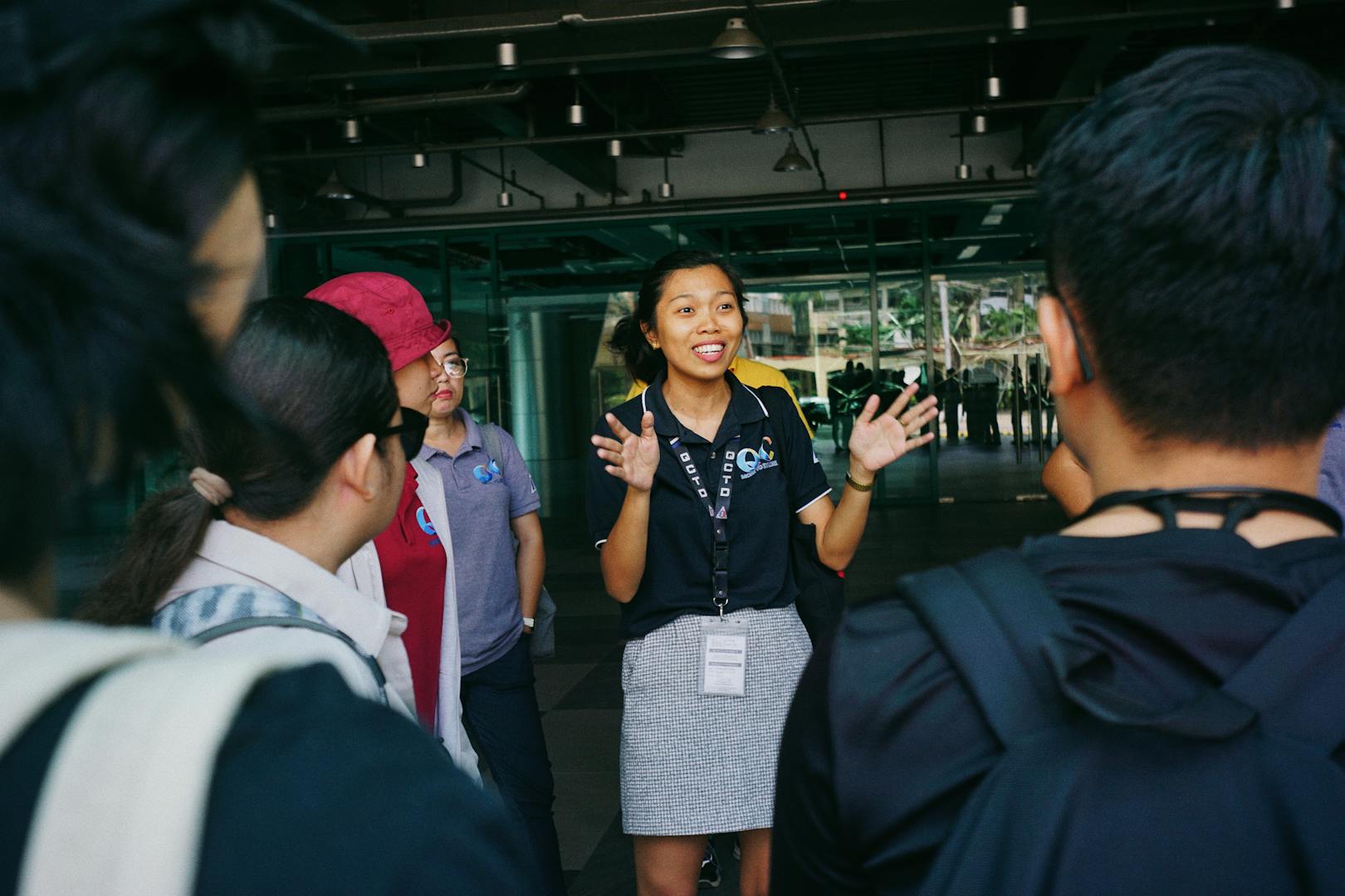 Food tour guide leading group through a Taipei night market
