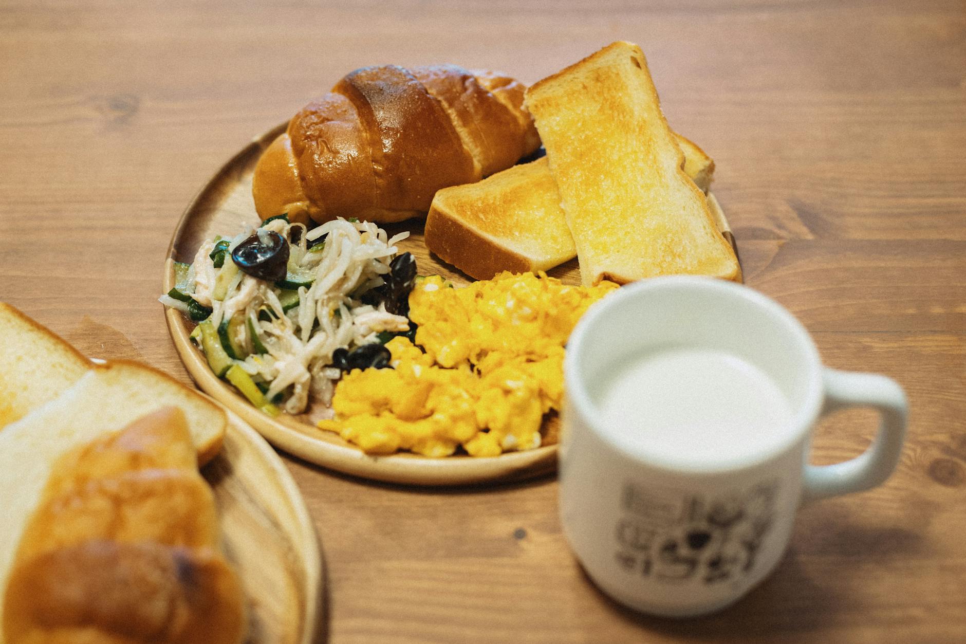 Traditional breakfast spread with various Asian morning foods