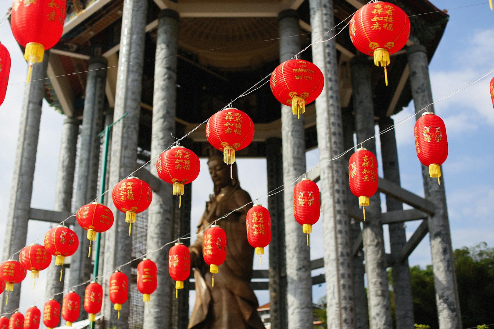 Religious offerings and incense at a Taipei temple altar
