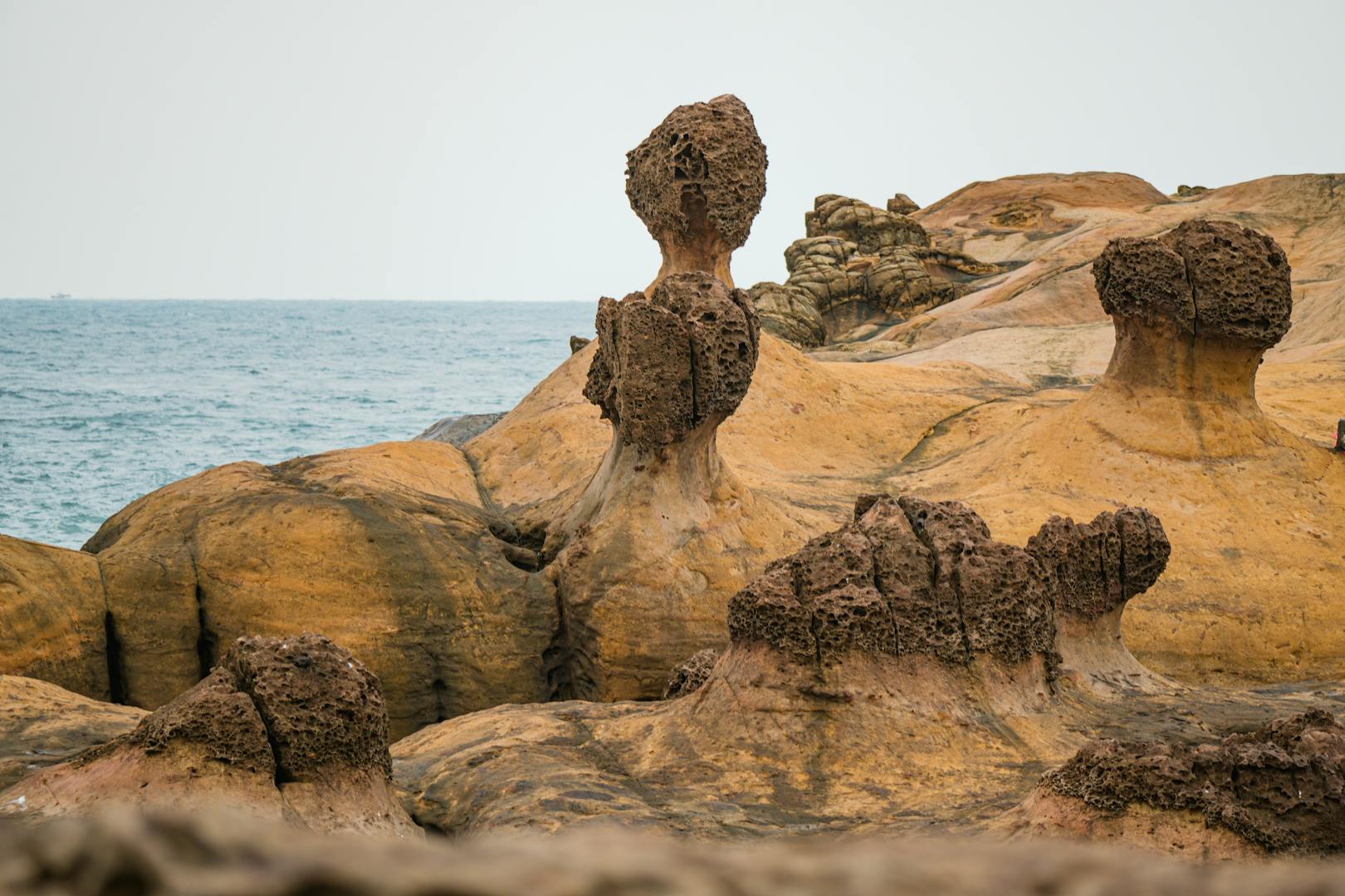 Coastal cliffs and rocky shoreline with ocean waves