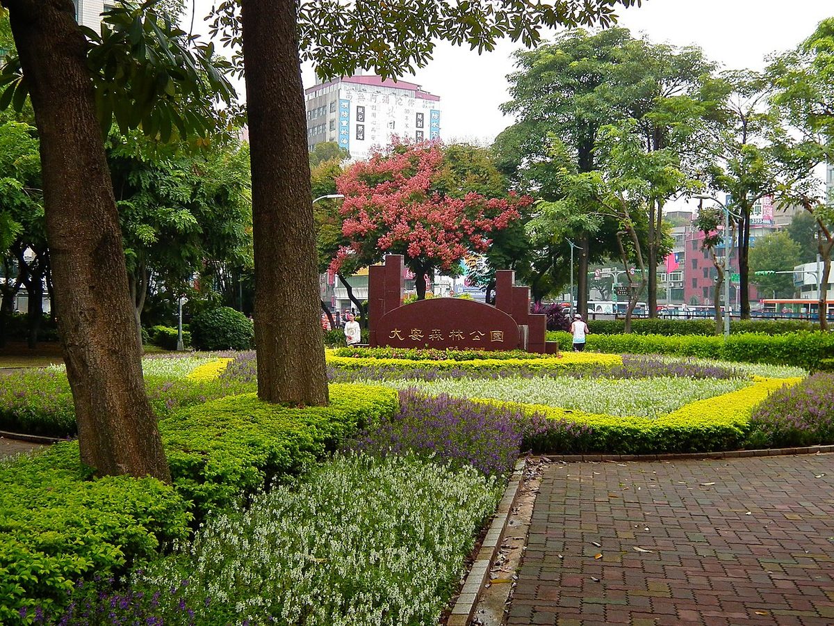 Azaleas and open lawns at Daan Forest Park in Taipei during the March azalea festival