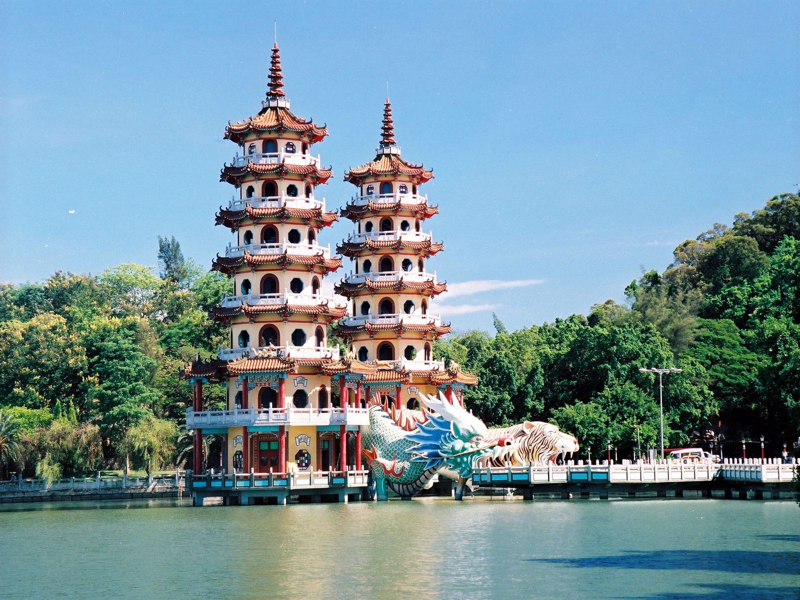 The Dragon and Tiger Pagodas rising above Lotus Pond in Kaohsiung under a blue sky