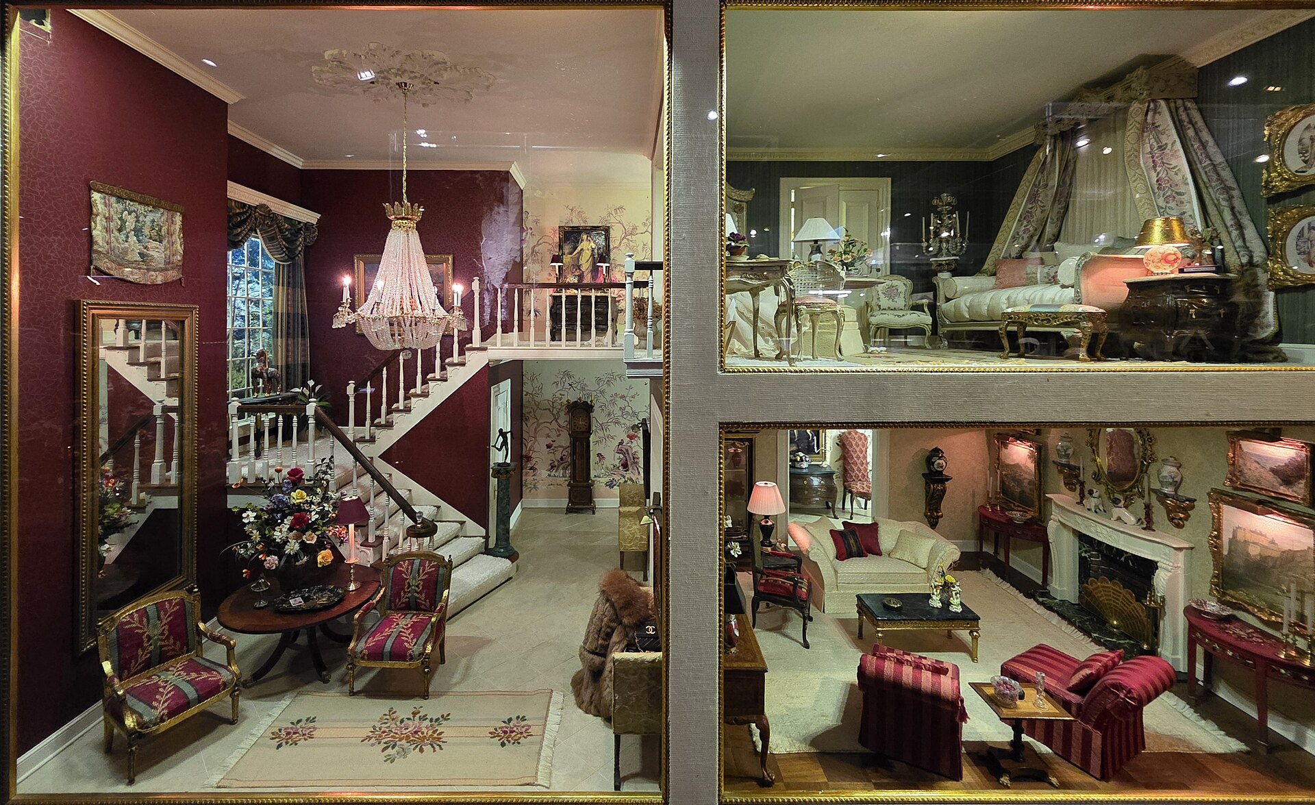 A miniature staircase, chandelier, bedroom and sitting room fill a furnished cutaway display at Taipei's Miniatures Museum of Taiwan.